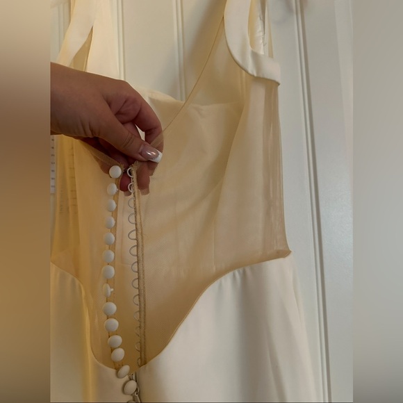 Chic Ivory Bridal Gown with Button Detail - Picture 8 of 12